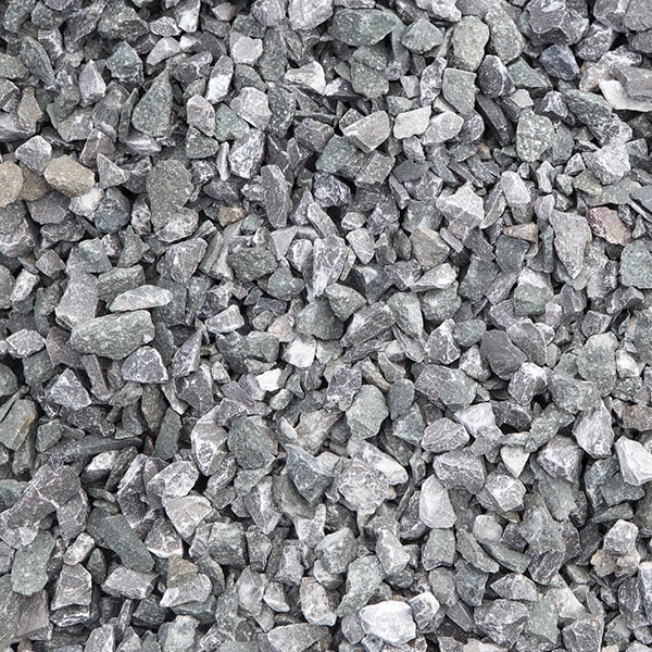 regularly applying a weed barrier and using a stabilizing product can help prevent weed growth in walkway gravel